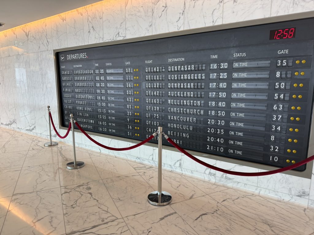 Big Retro Departure Board in the Lounge Qantas First Class Lounge Sydney Review 2025
